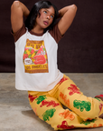 Kandia is wearing Vintage Tee in Gummy Bear and Gummy Bear Paintstamped Work Pants in Butter Yellow