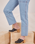 Side view pant leg close up of Carpenter Jeans in Light Wash worn by Allison