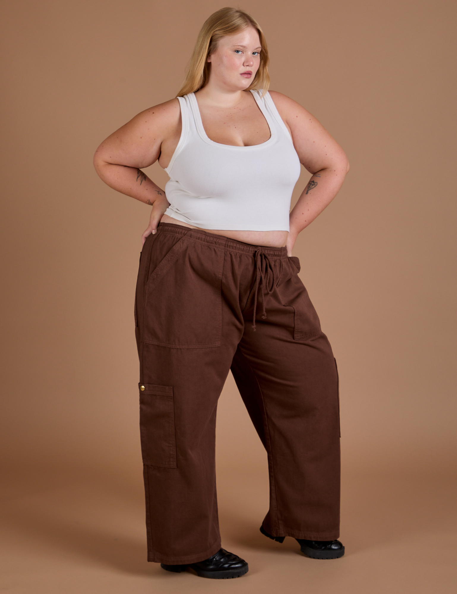 Drop Pocket Cargo Pants in Fudgesicle Brown and Cropped Tank in vintage tee white worn by Juliet