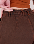 Overdyed Denim Trouser in Fudge back close up on Alex
