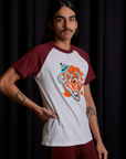Angled front view of Raglan Tee in Clown on Anthony