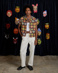 Jerrod is 6'3" and wearing M Halloween Masks Pantry Button-Up paired with vintage tee white Work Pants
