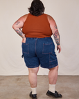 Back view of Carpenter Shorts in Dark Wash and burnt terracotta Cropped Tank on Sam
