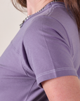 Jr. Varsity Tee in Faded Grape shoulder close up on Alex