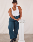 Morgan is wearing Work Pants in Lagoon and vintage tee off-white Tank Top