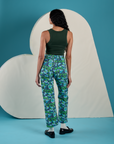 Back view of Work Pants in Angel Print and swamp green Cropped Tank on Shahana