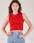 Alex is 5’8” and wearing P Muscle Tee in Mustang Red