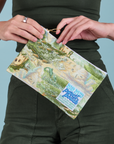 Ocean and Sky Printed Pencil Pouch held by Alex