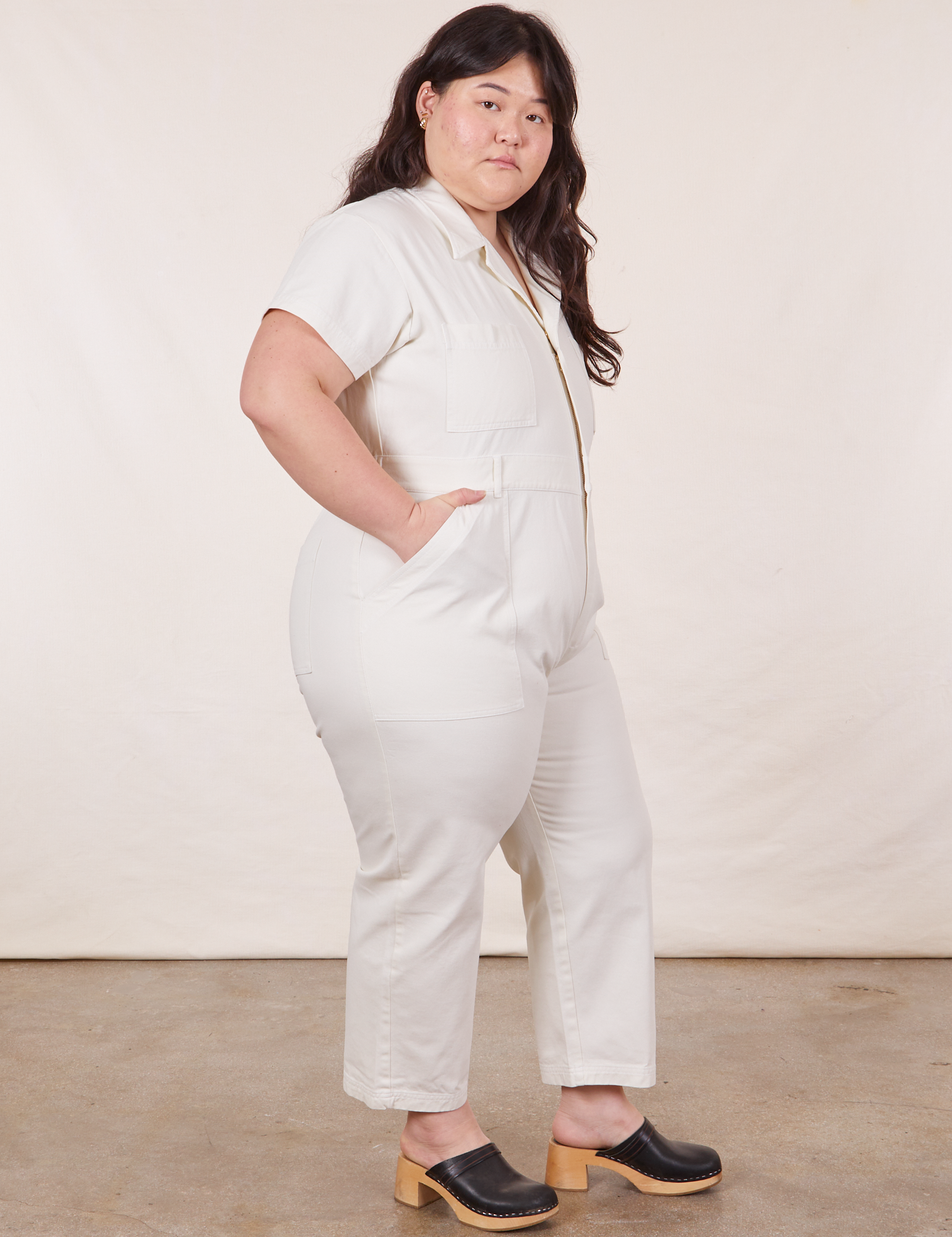 Side view of Petite Short Sleeve Jumpsuit in Vintage Tee Off-White on Ashley