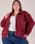 Marielena is wearing Mechanic Jacket in Mustang Red