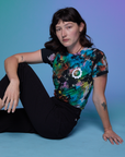 Alex is wearing Classic Tee in Rainbow Magic Waters