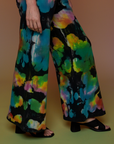Pant leg side view close up of Tie Dyed Wide Leg Sweat Pants on Alex