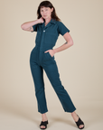 Alex is 5'8" and wearing XS Short Sleeve Jumpsuit in Lagoon