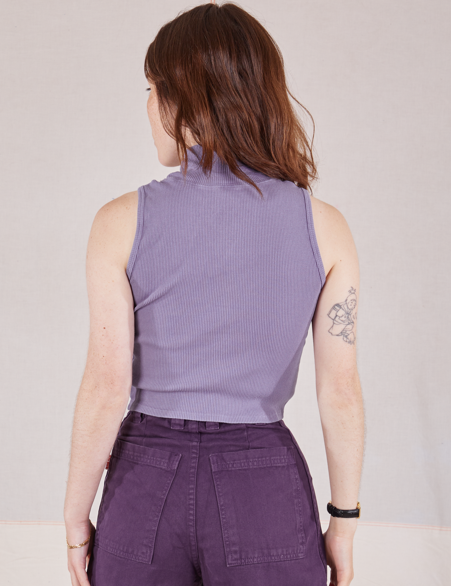 Back view of Sleeveless Essential Turtleneck in Faded Grape on Hana