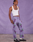 Angled front view of Paintstamped Work Pants in Grape and Cropped Tank in Vintage Tee Off-White