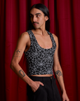 Angled front view of Cropped Tank Top in Spider Webs on Anthony