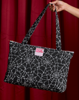 Spider Webs Printed XL Zip Tote held by model