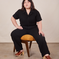Ashley is wearing Short Sleeve Jumpsuit in Basic Black