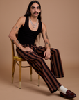 Black Stripe Work Pants in Fudgesicle Brown and black Cropped Tank worn by Anthony