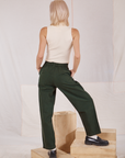 Back view of Heavyweight Trousers in Swamp Green and vintage tee off-white Sleeveless Turtleneck on Madeline