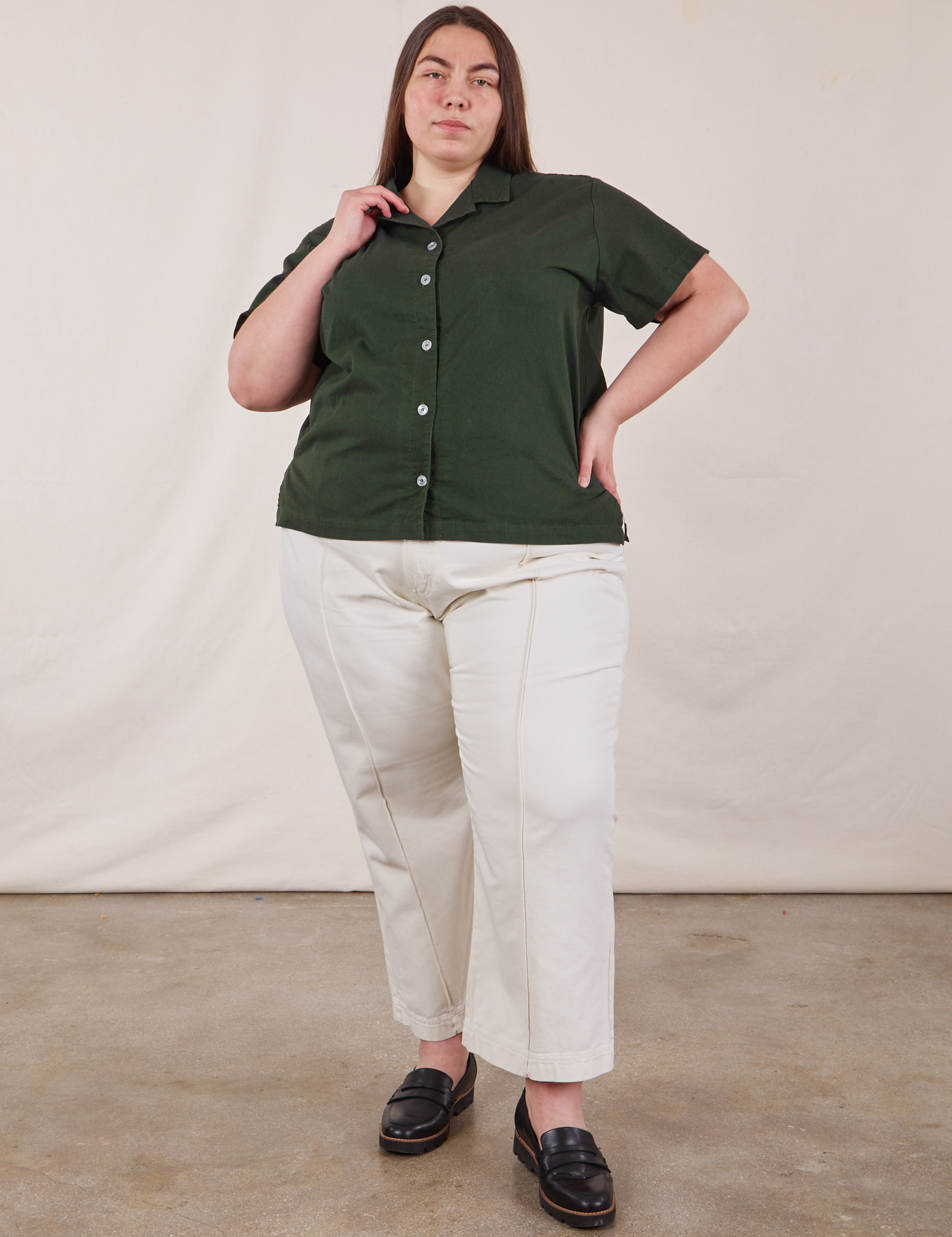 Marielena is wearing Pantry Button-Up in Swamp Green and vintage tee off-white Western Pants
