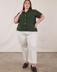 Marielena is wearing Pantry Button-Up in Swamp Green and vintage tee off-white Western Pants