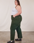 Side view of Work Pants in Swamp Green and vintage tee off-white Cropped Tank on Marielena