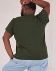 Organic Vintage Tee in Swamp Green back view on Elijah