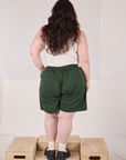 Trouser Shorts in Swamp Green back view on Ashley
