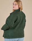 Angled back view of Denim Work Jacket in Swamp Green on Juliet