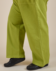 Work Pants in Gross Green pant leg side view on Sam