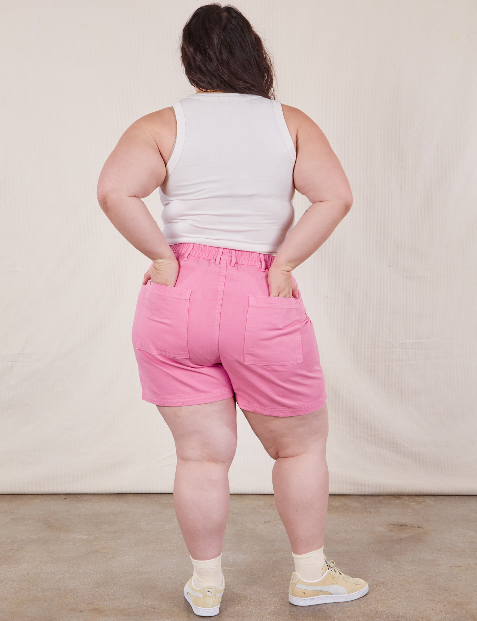 Back view of Classic Work Shorts in Bubblegum Pink and Cropped Tank Top in vintage tee off-white on Ashley