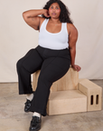Morgan is wearing Western Pants in Basic Black and Cropped Tank in Vintage Tee Off-White