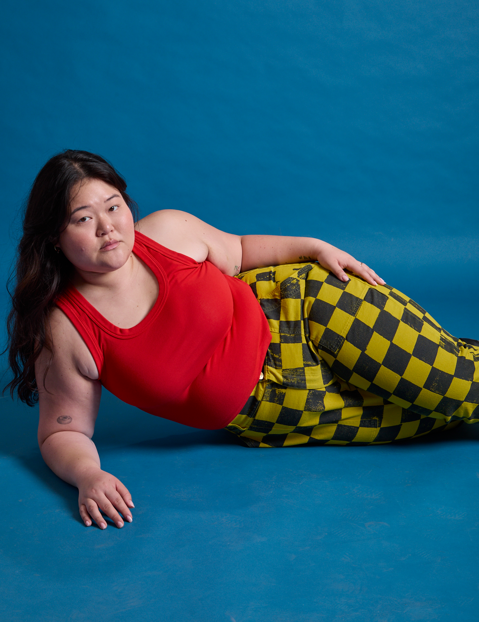 Checkerboard Work Pants in Yellow/Black and mustang red Tank Top on Ashley