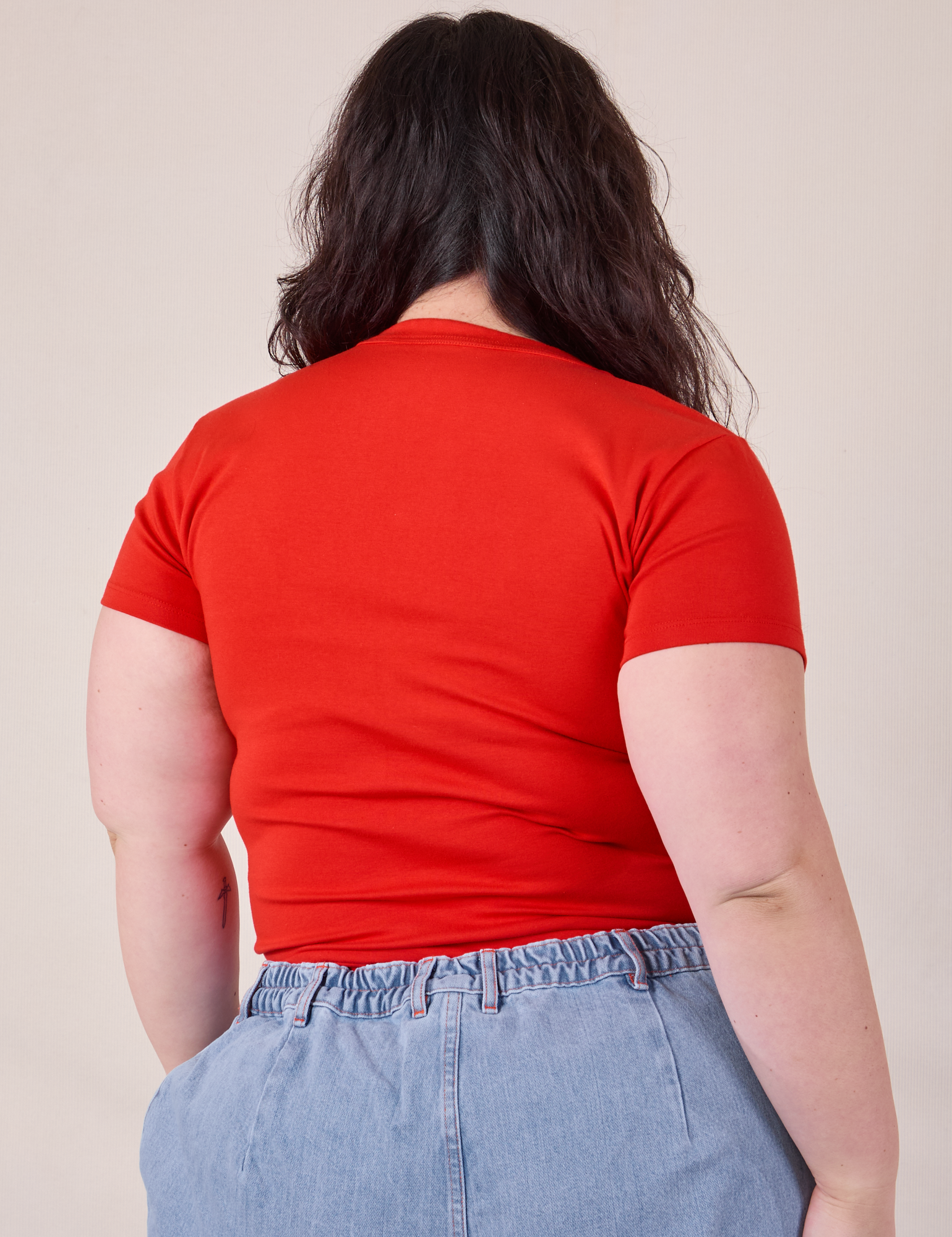 Baby Tee in Mustang Red back view on Ashley