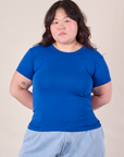 Ashley is 5'7" and wearing L Baby Tee in Royal Blue