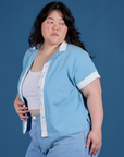 Angled front view of Painted Pantry Button-Up in Baby Blue on Ashley