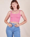 Alex is wearing Cropped Cami in Bubblegum Pink and light wash Frontier Jeans