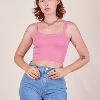 Alex is wearing Cropped Cami in Bubblegum Pink and light wash Frontier Jeans