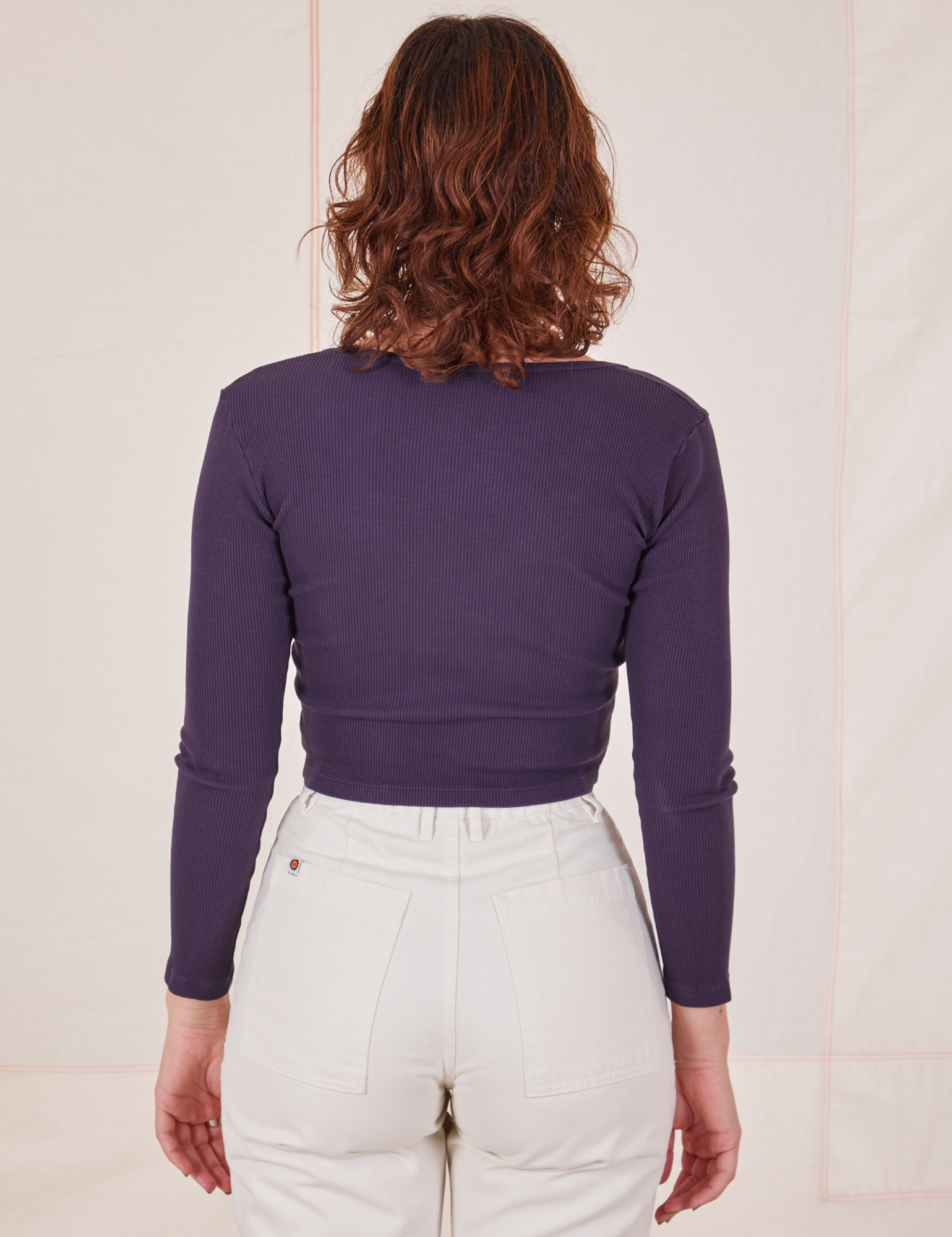 Back view of Long Sleeve V-Neck Tee in Nebula Purple worn by Alex