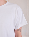 Cropped Burly Tee in Vintage Tee White sleeve close up on Quinn