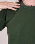 Cropped Burly Tee in Swamp Green front close up on Alex