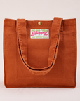 Shopper Tote Bag in Paprika with straps hanging down front of bag