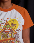 Short Sleeve Raglan Tee in Haunted House sleeve close up on Kandia