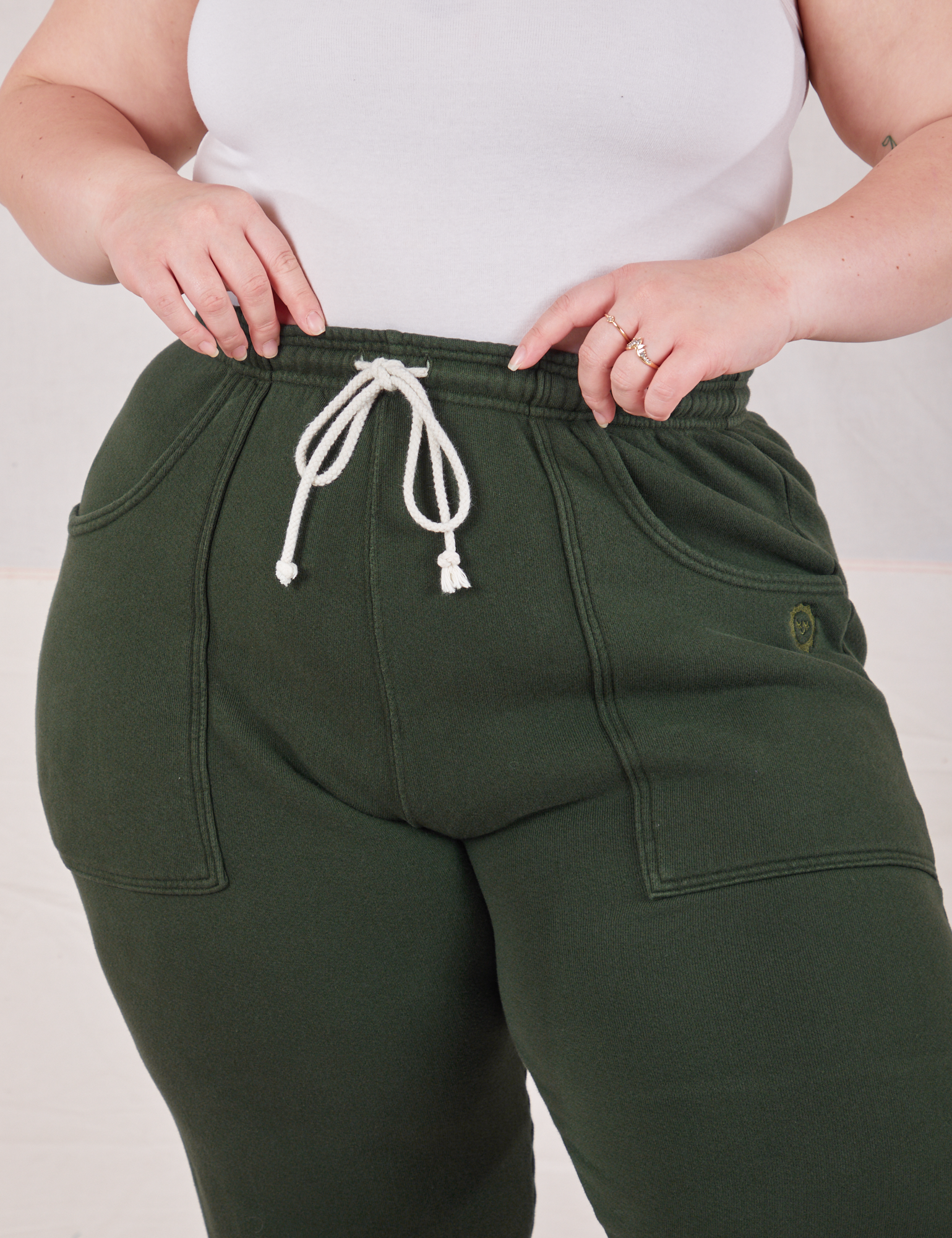 Rolled Cuff Sweat Pants in Swamp Green front close up on Ashley