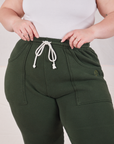 Rolled Cuff Sweat Pants in Swamp Green front close up on Ashley