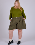 Pleated Trouser Shorts in Surplus Green and summer olive Long Sleeve Baby Tee worn by Juliet