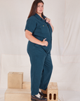Heritage Short Sleeve Jumpsuit in Lagoon side view on Katie
