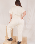 Heritage Short Sleeve Jumpsuit in Natural back view on Katie