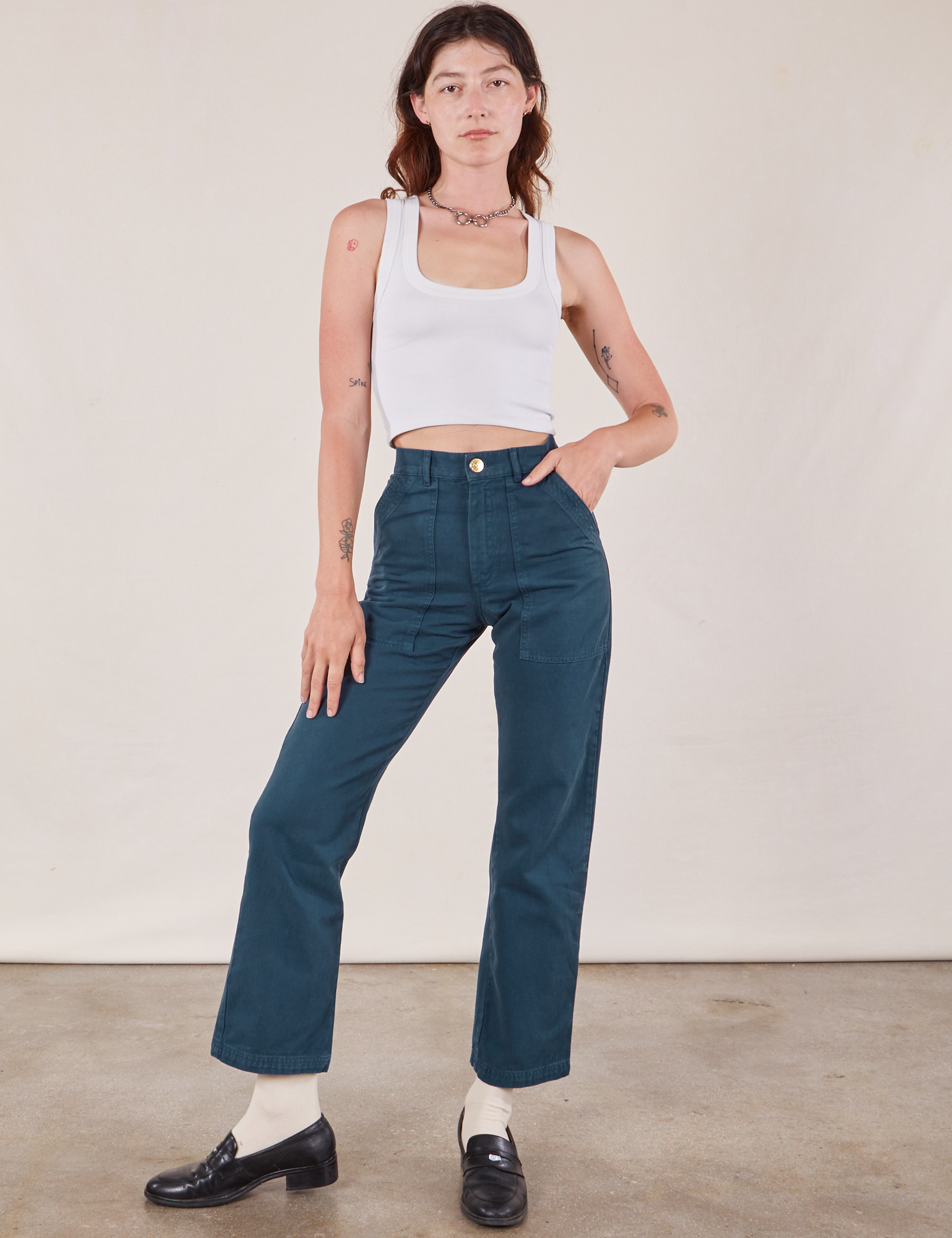 Alex is 5'8" and wearing XXS Work Pants in Lagoon paired with vintage tee off-white Cropped Tank